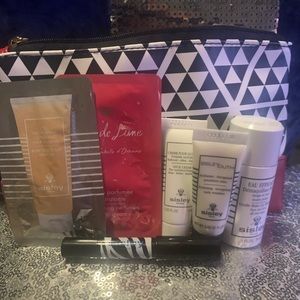 Sisley skin care set & makeup bag